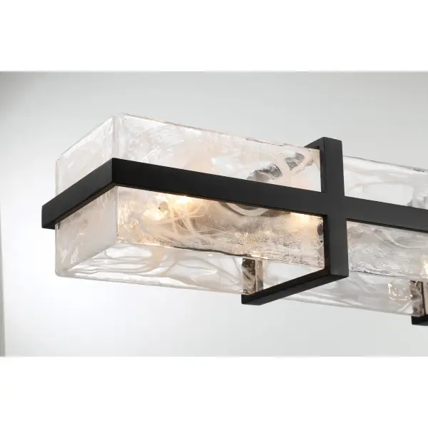 The Cloud Break island chandelier makes a bold statement with its 60-inch linear design and 12 cloud glass shades. The coal black finish provides striking contrast while the textured glass creates soft, diffused illumination perfect for kitchen islands and dining tables. - alternate view