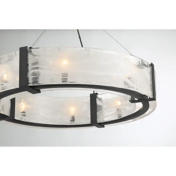The Cloud Break pendant combines industrial-modern aesthetics with sophisticated cloud glass shades. Its substantial 32-inch width and coal black finish create bold visual impact while eight candelabra bulbs provide ample illumination. - alternate view