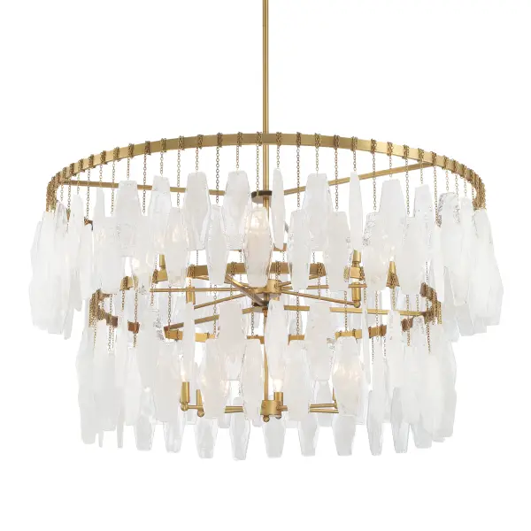 The Willow pendant makes a dramatic statement with 14 candelabra lights arranged across a 45-inch span. Legacy brass finish paired with white swirl glass shades creates timeless elegance perfect for large dining rooms and grand entryways.