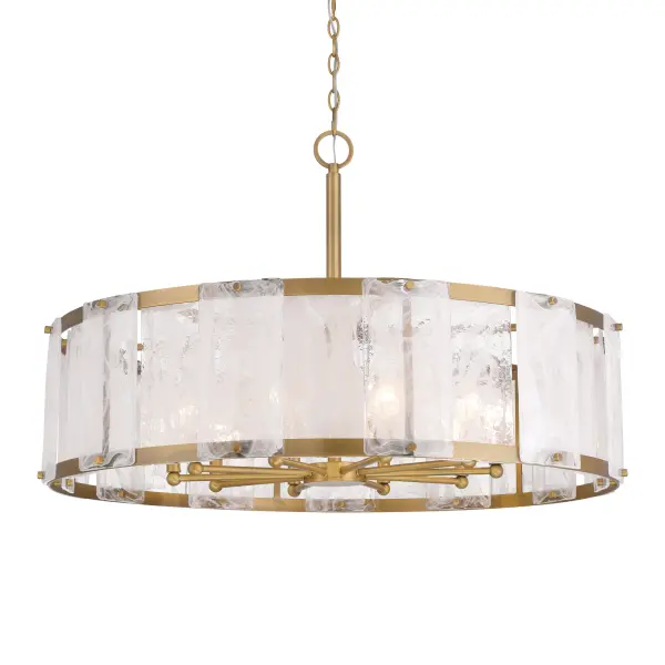 The Veil 36" pendant combines transitional elegance with substantial presence. Ten candelabra bulbs behind white swirl glass create soft, diffused illumination while the Legacy Brass finish adds warmth and sophistication to dining rooms and grand spaces.
