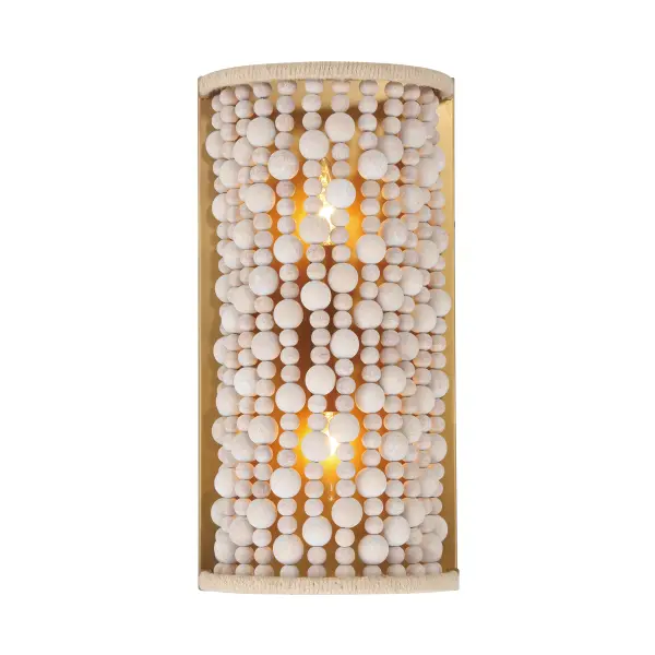 The Horsmore wall sconce brings organic warmth to any space with its distinctive bleached wooden beads and hemp rope accents. The painted legacy brass finish adds subtle sophistication while the natural materials create a relaxed, coastal aesthetic.