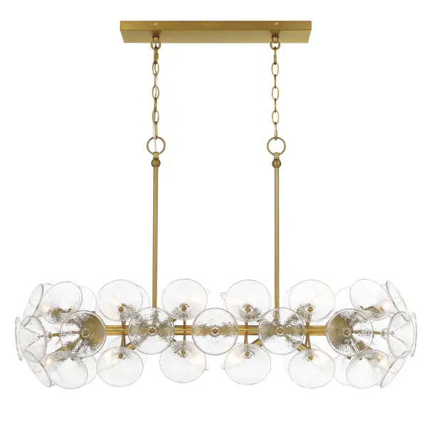 The Winter collection brings sophisticated illumination to dining and kitchen spaces with its linear design featuring 12 candelabra lights. Textured clear fluted glass shades paired with soft brass create a warm, inviting ambiance.