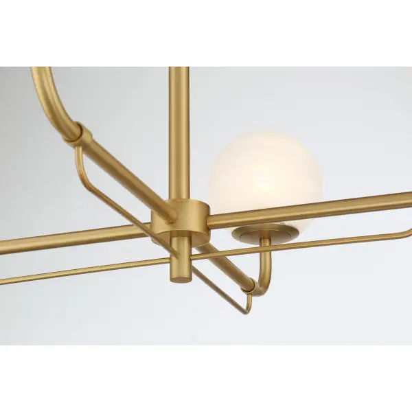 The Whitehall chandelier combines timeless design with transitional styling, featuring a warm Legacy Brass finish and soft etched alabaster glass shades. At 30 inches wide, it provides substantial presence while maintaining refined proportions. - alternate view