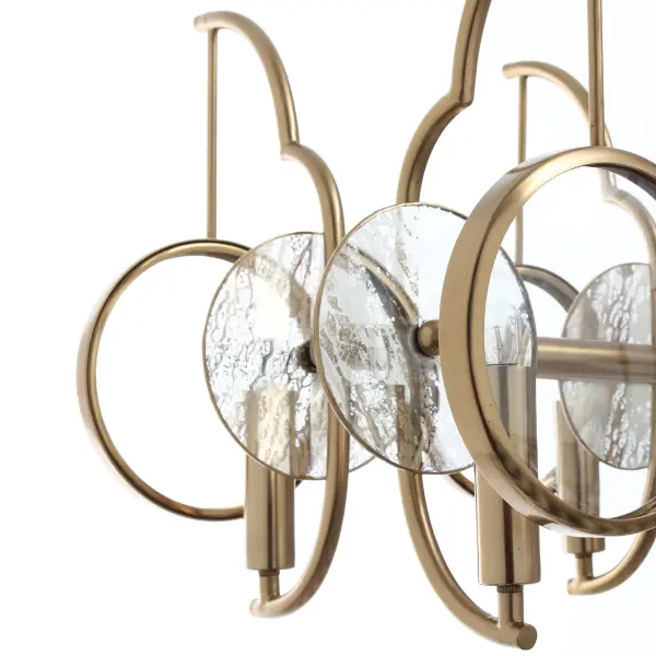 The Into Focus island chandelier makes a bold statement with 10 candelabra lights arranged in a linear design. Artisan brass finish paired with clear dome glass and antique reflecting glass creates visual depth and warmth, perfect for modern kitchens and dining spaces. - alternate view