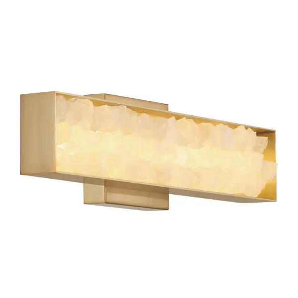 The Divinely LED Wall Sconce combines luxurious quartz crystalline with warm Celeste Brass for a sophisticated, spa-like ambiance. ADA-compliant design with exceptional 94 CRI LED ensures both accessibility and superior color rendering.