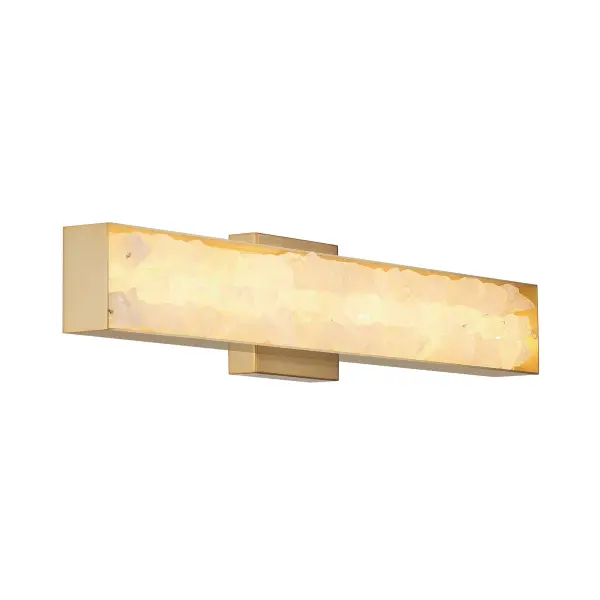 The Divinely wall sconce combines contemporary brass finish with natural quartz crystalline accents for sophisticated ambient lighting. ADA-compliant design with integrated LED technology delivers 1881 lumens at 93 CRI.