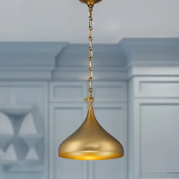 The Cedar Lane pendant combines classic transitional styling with a warm Legacy Brass finish. Its compact 12.75-inch size makes it perfect for smaller spaces or grouped installations over kitchen islands. - alternate view