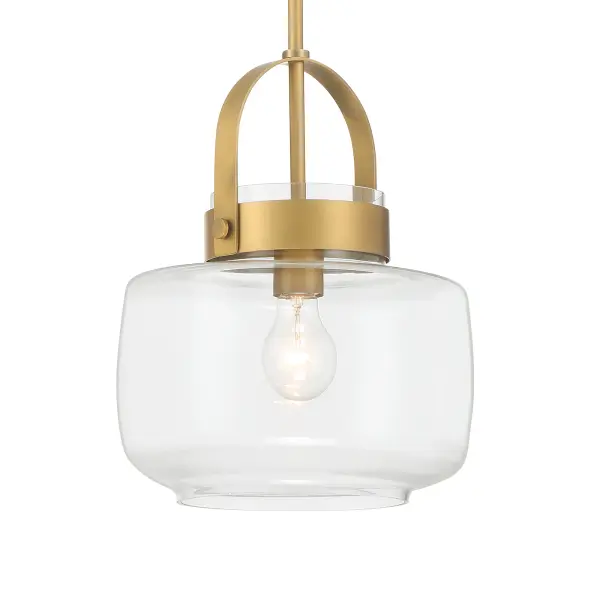 The WickGlow pendant combines warm Legacy Brass finish with clear glass for versatile transitional style. At 11 inches wide, it's perfectly sized for kitchen islands, breakfast nooks, or entryways.