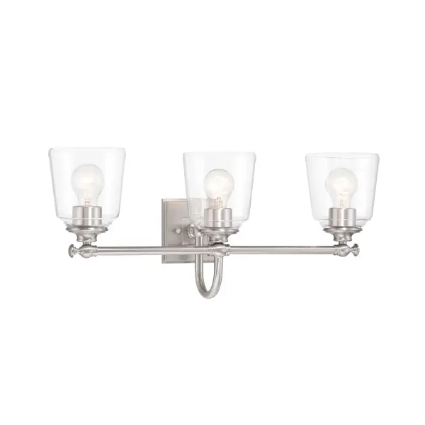 The Antonia vanity light combines brushed nickel finish with clean glass shades for a contemporary look. At 25.25 inches wide, it's ideal for medium to large vanities, providing ample illumination for grooming tasks.