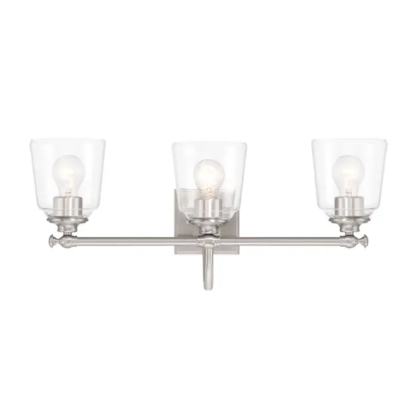 The Antonia vanity light combines brushed nickel finish with clean glass shades for a contemporary look. At 25.25 inches wide, it's ideal for medium to large vanities, providing ample illumination for grooming tasks. - alternate view