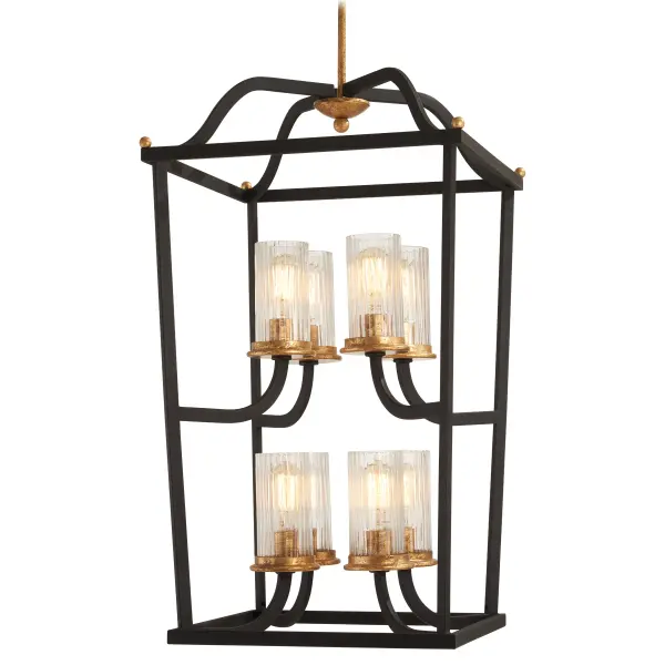 The Posh Horizon pendant combines transitional elegance with modern flair. Its sand black finish with gold leaf accents and clear ribbed glass shades create dramatic visual interest while providing ample illumination for dining and entertaining spaces.