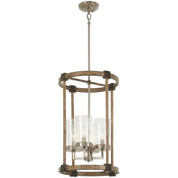 The Bridlewood 4-Light Pendant combines transitional elegance with farmhouse charm. Its stone grey and brushed nickel finish paired with clear seeded glass creates visual interest while providing ample illumination for intimate spaces.