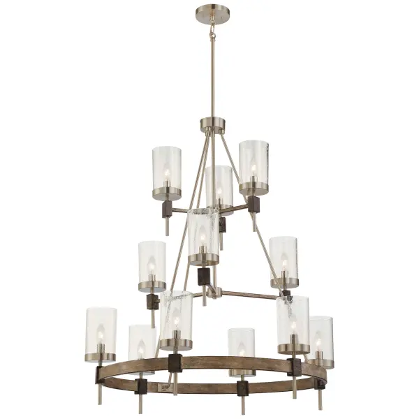 The Bridlewood chandelier combines rustic elegance with transitional styling through its stone grey and brushed nickel finish. With 12 candelabra lights and clear seeded glass, it delivers substantial illumination and visual impact for large spaces.