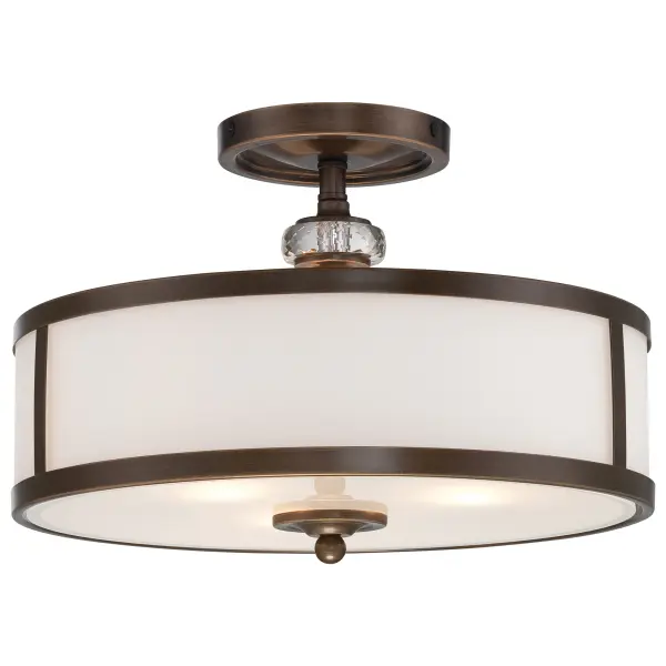 The Thorndale semi-flush mount combines timeless transitional styling with practical functionality. Its Dark Noble Bronze finish and etched white glass create warm, diffused lighting perfect for intimate spaces.