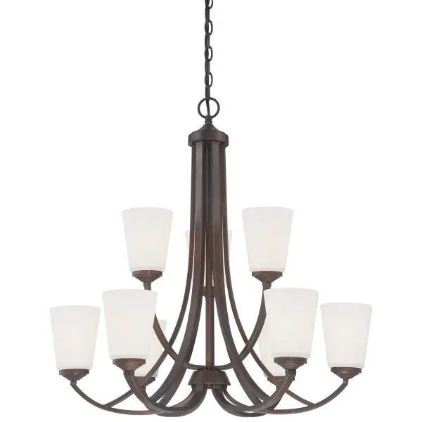 The Overland Park chandelier combines traditional elegance with transitional versatility. Nine lights provide ample illumination through etched white glass shades, while the vintage bronze finish adds warmth and character to any space.