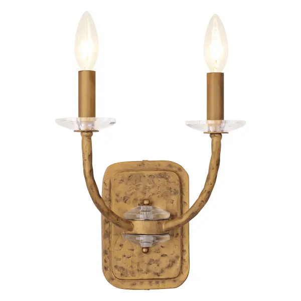 The Atella wall sconce combines hammered metalwork in Ashen Gold with faceted crystal bobeches for a refined traditional look. Compact at under 12 inches, it's ideal for bathrooms, hallways, and intimate spaces.