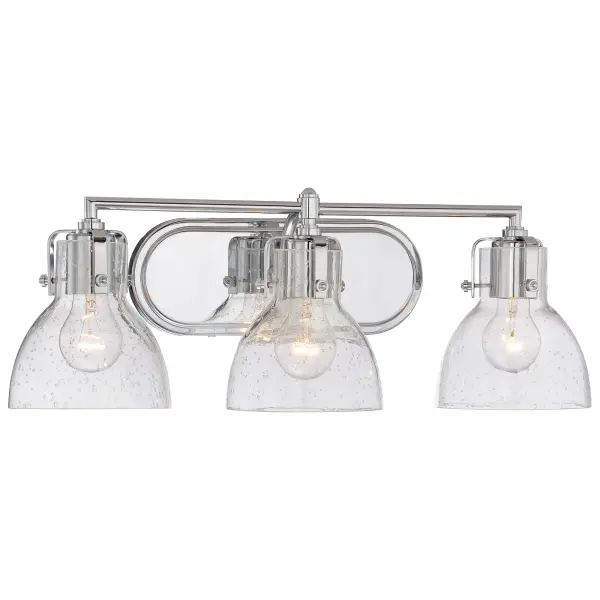 This 3-light bath fixture combines transitional elegance with practical illumination. The clear seeded glass shades add vintage texture while chrome finish keeps it contemporary. At 23 inches wide, it's perfectly sized for standard vanities.