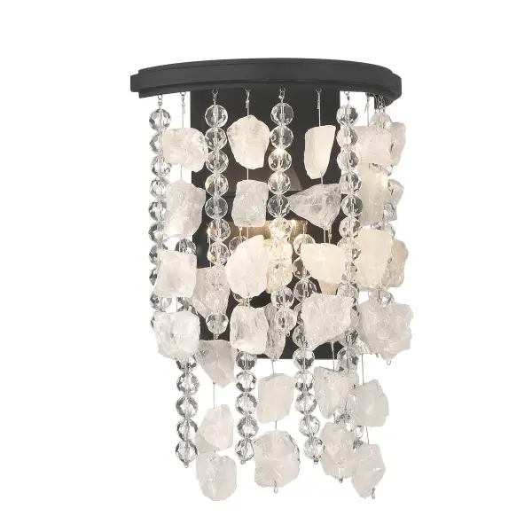 This sophisticated wall sconce combines a striking Sand Coal Black finish with shimmering quartz crystalline and cut glass beads, creating a glamorous focal point. Compact at 12" tall, it delivers elegant ambient lighting perfect for intimate spaces.