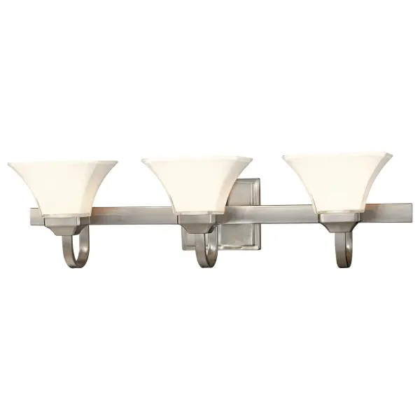 The Agilis 3-Light Bath Vanity Light combines transitional elegance with practical illumination. Its 32-inch width and brushed nickel finish complement a variety of bathroom styles, while the Lamina Blanca glass shades provide even, flattering light.