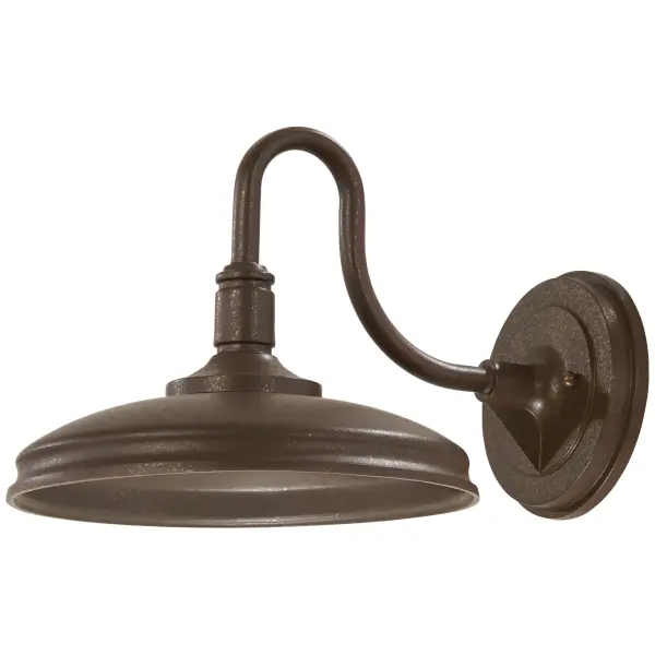 The Harbison LED wall sconce combines transitional styling with modern LED efficiency. Its textured bronze finish and integrated LED technology deliver 825 lumens of high-quality light (91 CRI) perfect for outdoor entryways and patios.