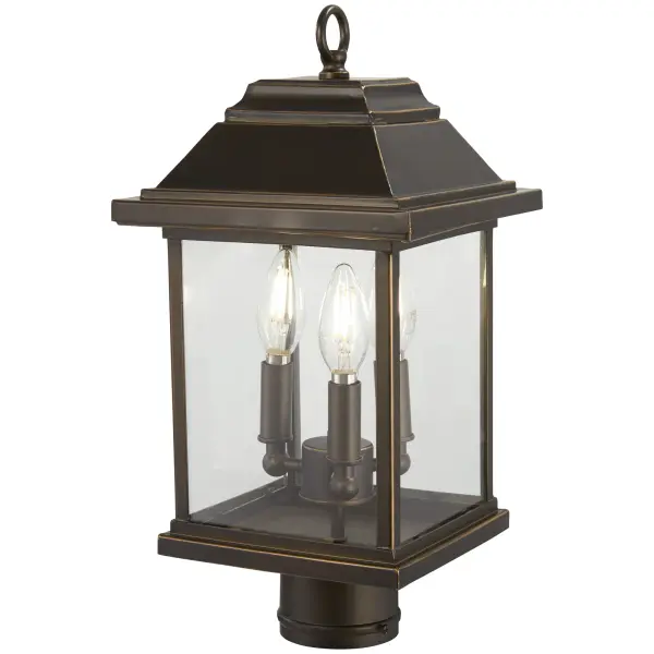 The Mariner's Pointe post mount brings nautical charm to outdoor spaces with its oil rubbed bronze finish accented by gold highlights. Three candelabra bulbs provide warm illumination through clear glass panels.