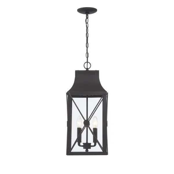 The De Luz outdoor lantern brings traditional elegance to exterior spaces with its oil rubbed bronze finish accented by gold highlights. Four candelabra bulbs provide ample illumination through clear glass panels. - alternate view