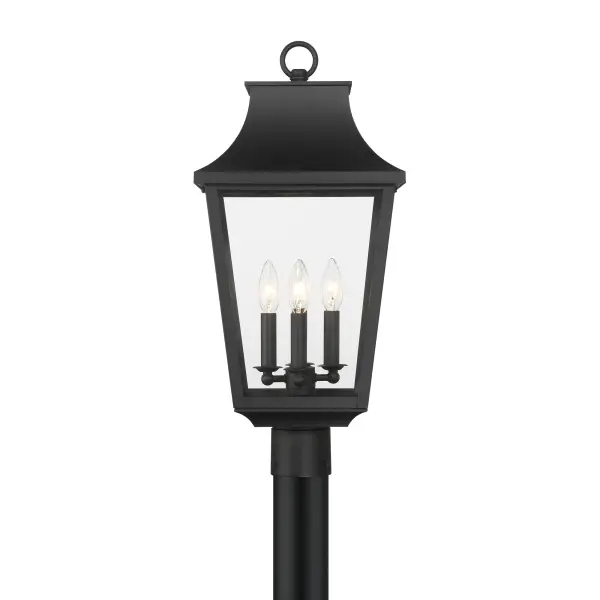 The Altimeter post mount combines contemporary design with durable aluminum construction and clear glass panels. Its 4-light configuration provides ample illumination for outdoor spaces while the Sand Coal Black finish adds modern sophistication. - alternate view
