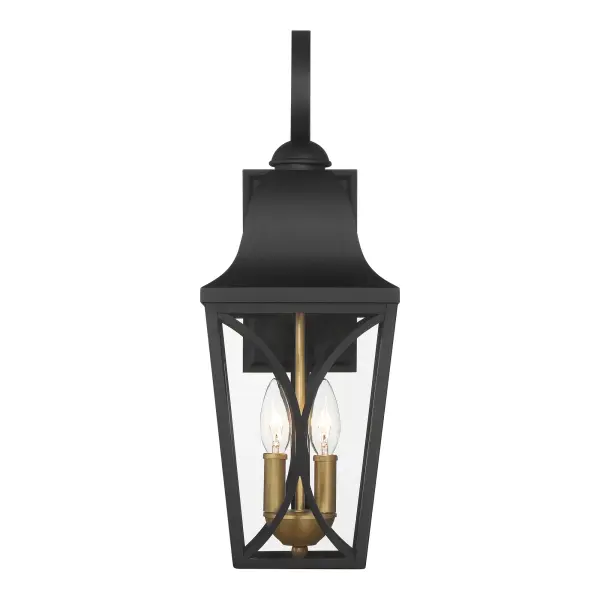 The Cardigan outdoor wall sconce combines traditional design with durable aluminum construction. Its sand coal black and olden brass finish creates visual interest, while clear glass panels provide bright illumination. - alternate view