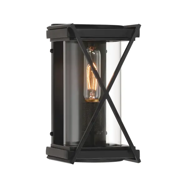 The Rockhill outdoor sconce combines modern design with practical outdoor lighting. Its compact 10.5" profile and dark matte black finish complement contemporary architecture while clear glass maximizes light output.