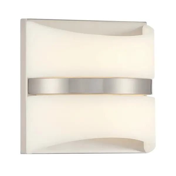 The Velaux LED wall sconce delivers efficient, high-CRI lighting in a compact 6.5" profile. Its brushed nickel finish and faux alabaster shade create a soft, diffused light ideal for bathrooms and hallways.