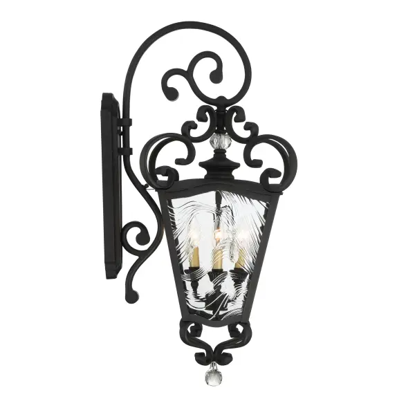 The Brixton Ivey combines traditional lantern styling with transitional appeal through its sand coal finish and soft brass accents. The clear ripple glass creates beautiful light patterns while the substantial 32-inch height makes a strong architectural statement at entryways. - alternate view
