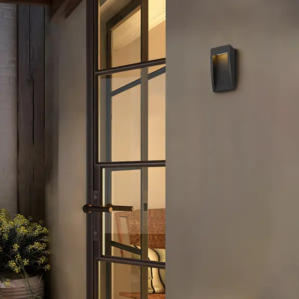 The Taper LED Wall Sconce combines graceful curves with clean architectural lines for modern sophistication. Features 3-CCT dimmable control, ADA compliance, and dark sky friendly certification for versatile outdoor illumination. - alternate view
