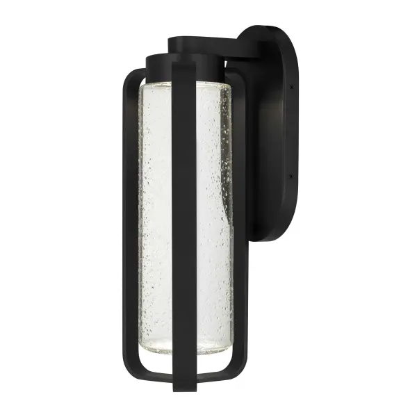 The Clover combines blown seeded glass with a minimalist black frame for sophisticated outdoor illumination. Features 3-CCT dimmable LED technology and wet location rating for versatile exterior applications.