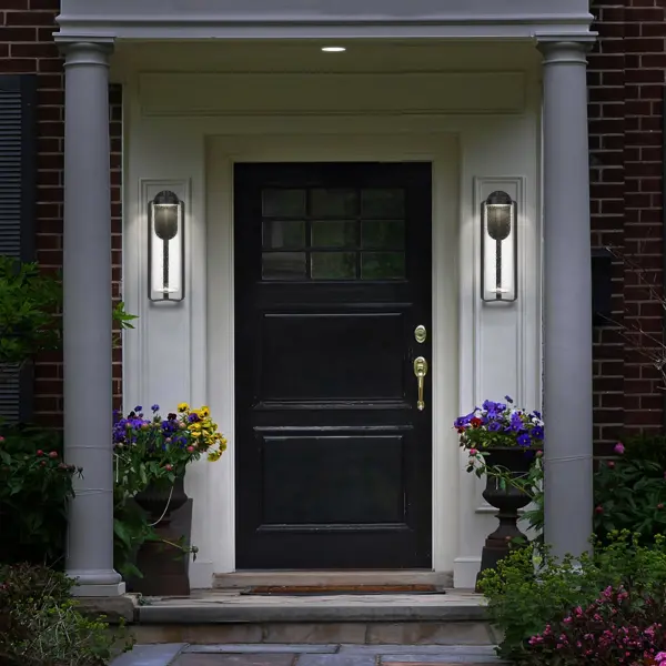 The Clover LED Wall Sconce combines blown seeded glass with a minimalist black frame, offering wet-rated durability and 3-CCT dimmable control for versatile outdoor illumination in contemporary settings. - alternate view