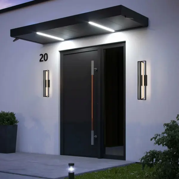 This striking 32.5" wall sconce combines modern geometric design with versatile wet-location performance. Perfect for making a statement in commercial lobbies or residential entryways with its bold intersecting rectangles. - alternate view