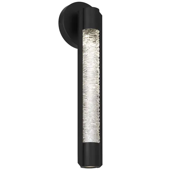 The Tig 18" Wall Sconce features pressed water-patterned glass that casts a beautiful mottled light effect, creating warmth and visual interest. With 3-CCT adjustable lighting, dimming, and wet location rating, it's perfect for outdoor spaces.