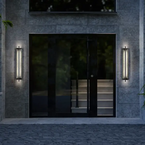 The Dakota 32" combines exquisite stained travertine with minimalist aluminum framing for dramatic curb appeal. Wet-rated durability meets customizable 3-CCT lighting and dimming for perfect outdoor ambiance. - alternate view