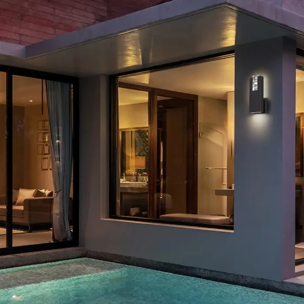 The Mille combines timeless keystone architecture with modern LED technology. Its cloudy crystal centerpiece creates stunning illuminated patterns while dual lighting provides both ambient and functional downlight. Wet-rated and ADA compliant. - alternate view