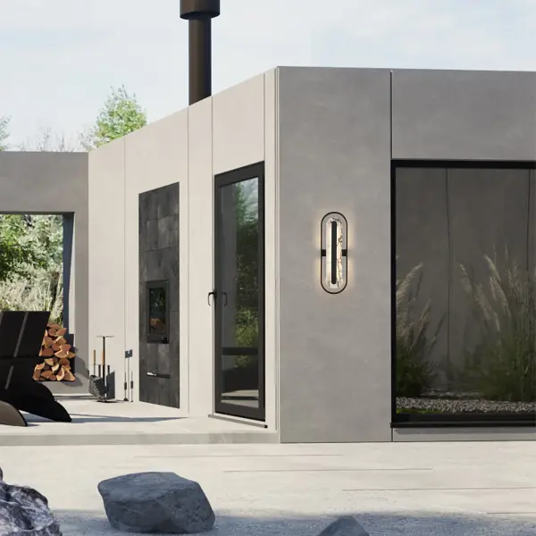 The Roundabout 28" LED Wall Sconce masterfully combines luxurious marble with a precision-crafted metal frame, creating a striking contemporary statement piece. Wet location rated with 3-CCT customizable lighting and dimmable functionality, it transitions seamlessly between indoor and outdoor spaces while delivering architectural sophistication. - alternate view