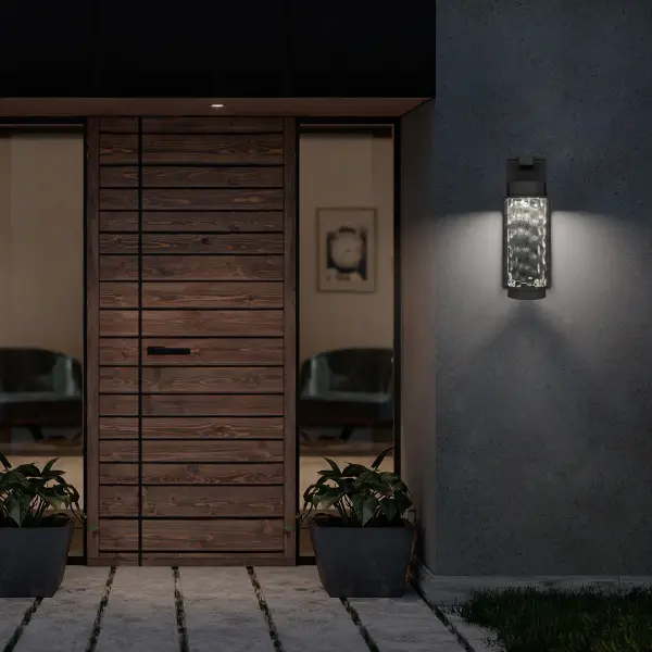 The Winston combines timeless design with modern LED technology, featuring mouth-blown hammered glass and adjustable color temperature. Wet-rated for durability in any weather, this 17" sconce delivers both beauty and functionality. - alternate view