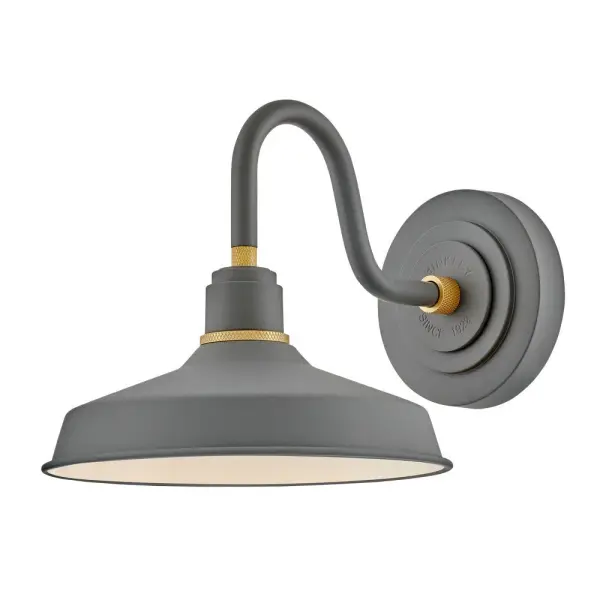 Decidedly industrious, Foundry reinvents purposeful lighting. Focused and direct, the sturdy aluminum shade features knurled brass details to offset a variety of finish options while casting a uniform light. The simple, understated form plants a vintage aesthetic for both inside and outside spaces while offering mix and match options that customize the look.