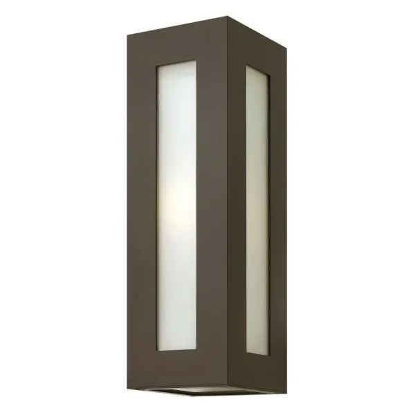 Dorian’s robust design in durable aluminum construction is offered in a Bronze finish. This contemporary fixture allows light to emit from white glass windows.