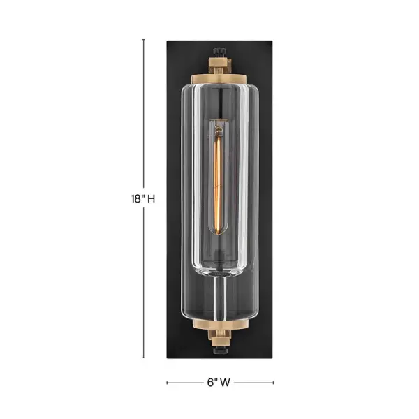 Solid and robust, Lourde’s name says it all. Heavy, layered glass cast in soft cylindrical shapes creates captivating reflections and refractions to illuminate any outdoor or indoor space with a warm glow. The modern, industrial details paired with the Black and Heritage Brass finishes make a bold statement among any aesthetic. - alternate view