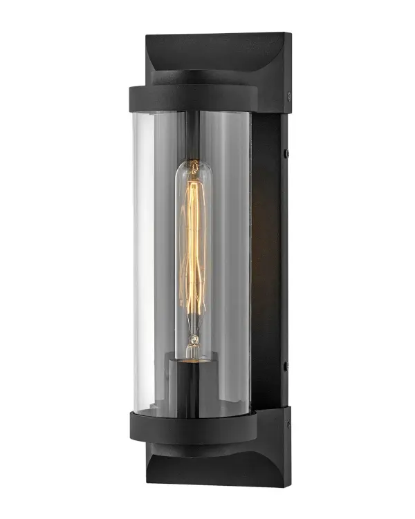 Take the indoor style of statement sconces outside. Drawing inspiration from the bygone era, Pearson emanates a feeling of nostalgia right outside your door. Featuring cast symmetrical end caps and clear cylindrical glass, Pearson combines the vintage look with a sleek backplate for the most sophisticated illumination in your outdoor living area. Available in a Burnished Bronze or Textured Black finish.