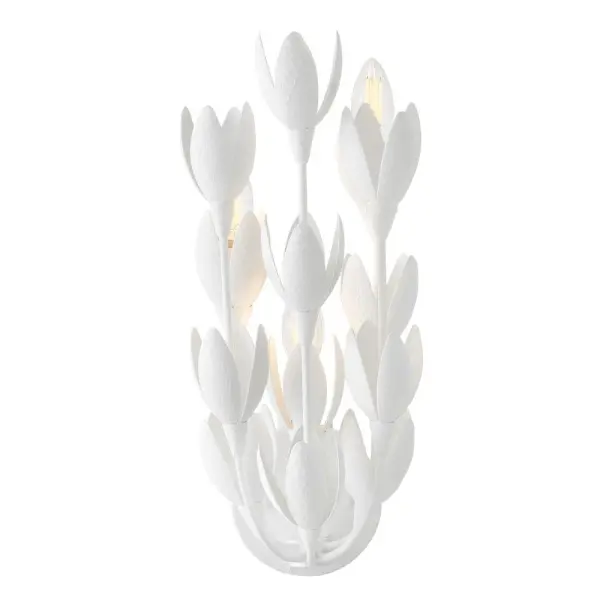 Flora is a work of art inspired by the delicate nature and beauty of florals. Blurring the line between lighting and sculpture, Flora's handmade, hand-painted blooms mesmerizingly unfold while the bulbs beautifully nestle inside. Flora is a part of the Lisa McDennon Collection.