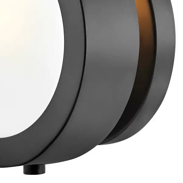 Synonymous with vintage glamour, Mercer's midcentury modern design has a cool simplicity that blends robust metal construction and circular glass shades that emit a soft glow, creating a perfect accent for any décor. Mercer is available in multiple finishes. - alternate view