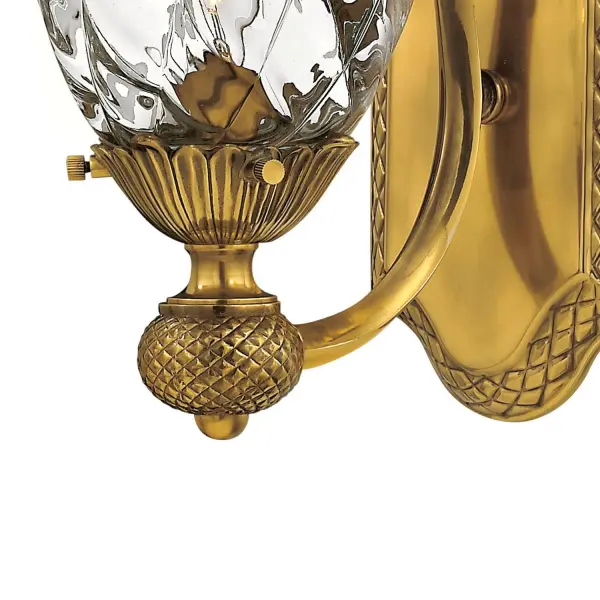 A Hinkley classic, the ornate Plantation collection features exceptional pineapple shaped, clear optic glass that makes a noble statement. The elaborate, decorative cast detailing is accentuated by its lush finish. - alternate view