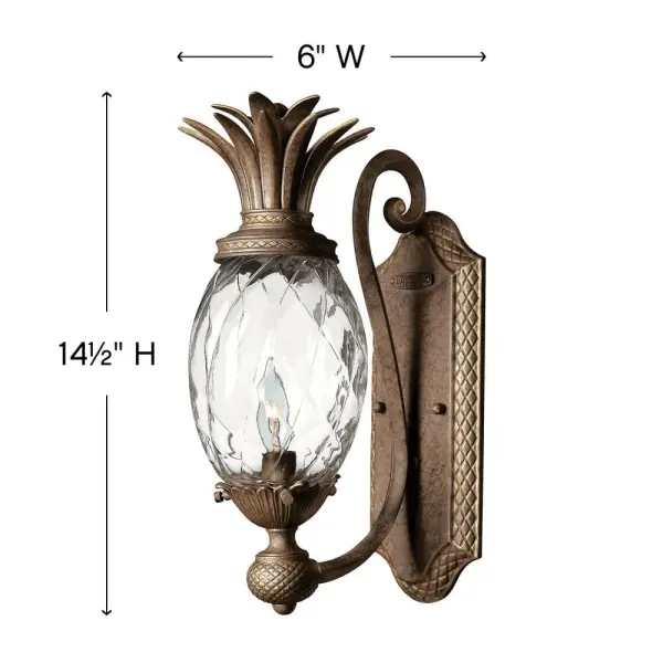A Hinkley classic, the ornate Plantation collection features exceptional pineapple shaped, clear optic glass that makes a noble statement. The elaborate, decorative cast detailing is accentuated by its lush finish. - alternate view