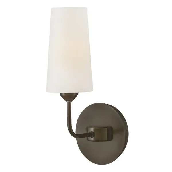 Lewis offers traditional charm paired with updated, transitional elements. Tall natural paper shades feature fine stitching detail against a Heritage Brass or Black Oxide finish to enhance timeless interiors.