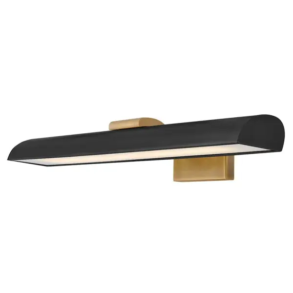 A uniquely shaped transitional task light, Alston creates a calming glow with warm integrated LEDs. Its bold, wide profile in Heritage Brass or Heritage Brass with Black seamlessly complements refined home décor, adding timeless sophistication to your living space or bathroom with an ambient glow.